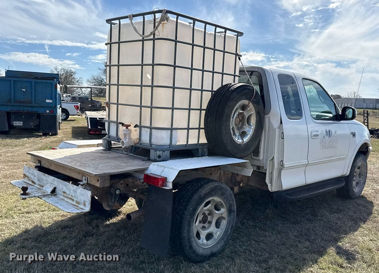 image for item EJ3482 1998 Ford F150 SuperCab flatbed pickup truck 