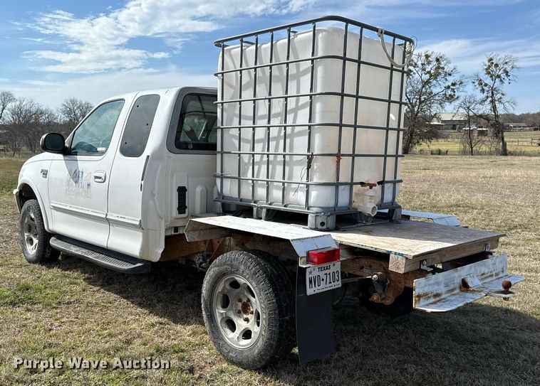 image for item EJ3482 1998 Ford F150 SuperCab flatbed pickup truck 