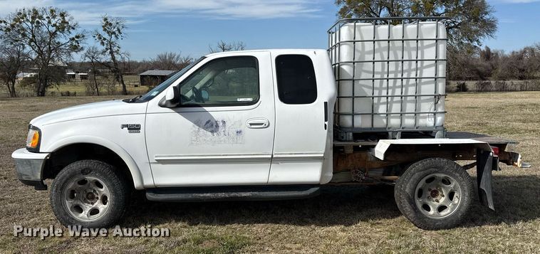 image for item EJ3482 1998 Ford F150 SuperCab flatbed pickup truck 