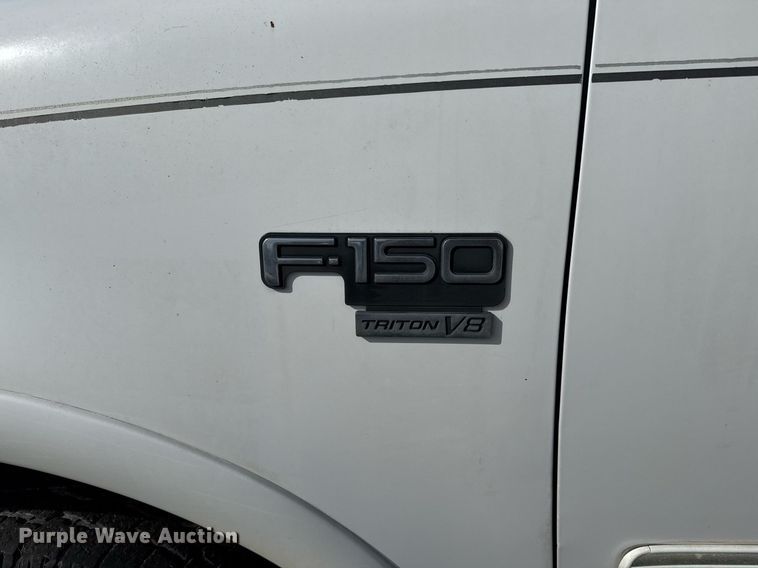 image for item EJ3482 1998 Ford F150 SuperCab flatbed pickup truck 