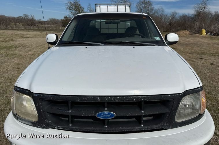 image for item EJ3482 1998 Ford F150 SuperCab flatbed pickup truck 