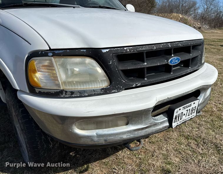 image for item EJ3482 1998 Ford F150 SuperCab flatbed pickup truck 