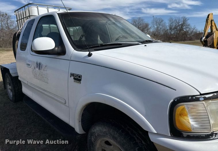 image for item EJ3482 1998 Ford F150 SuperCab flatbed pickup truck 