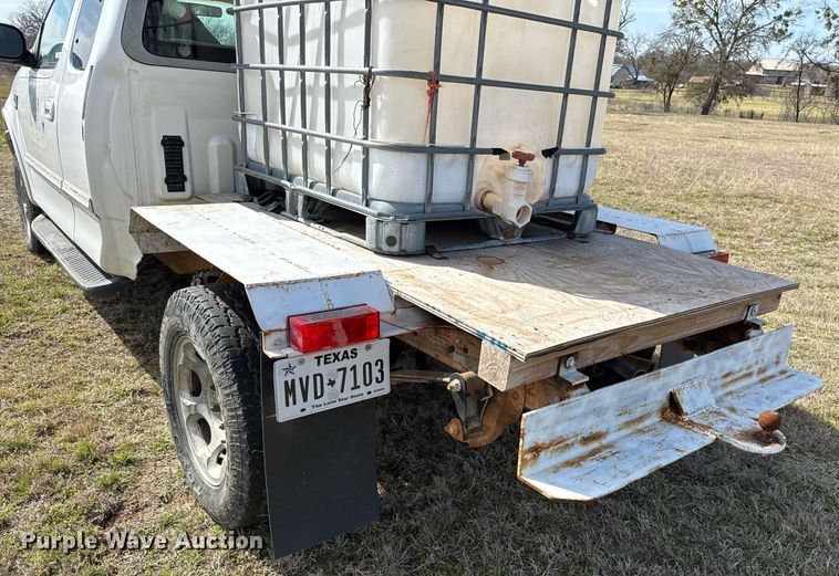 image for item EJ3482 1998 Ford F150 SuperCab flatbed pickup truck 