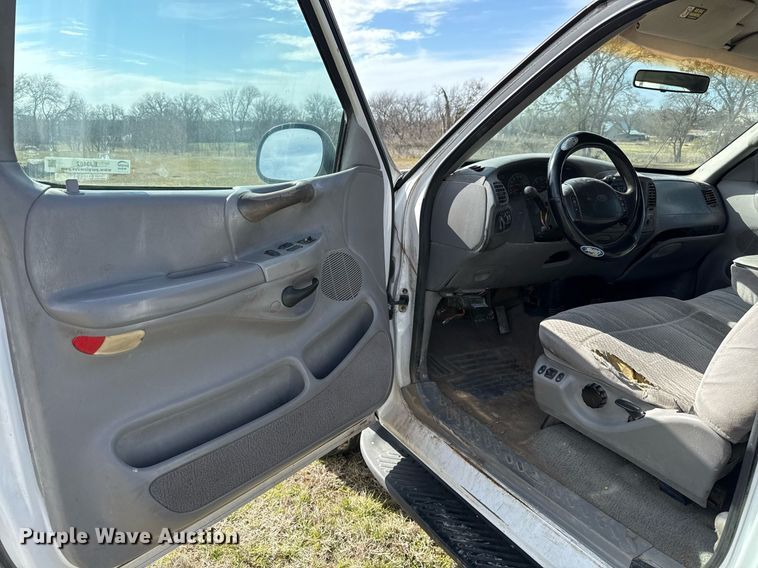 image for item EJ3482 1998 Ford F150 SuperCab flatbed pickup truck 