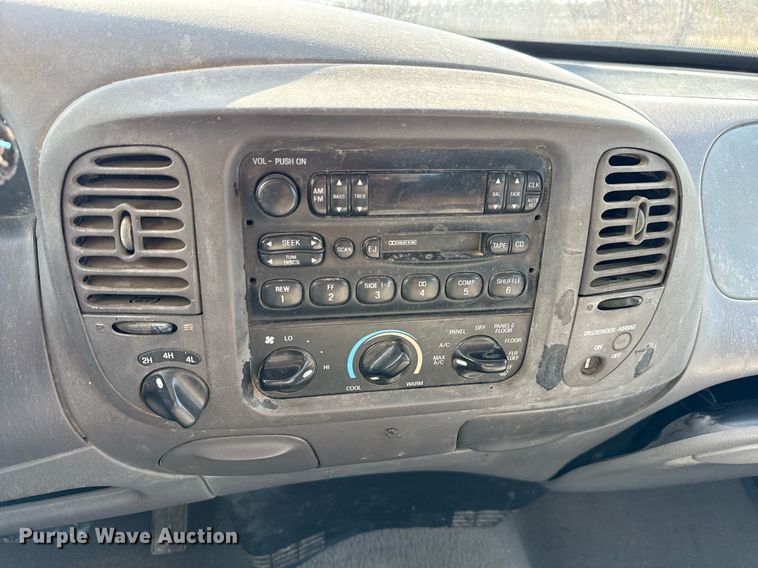 image for item EJ3482 1998 Ford F150 SuperCab flatbed pickup truck 