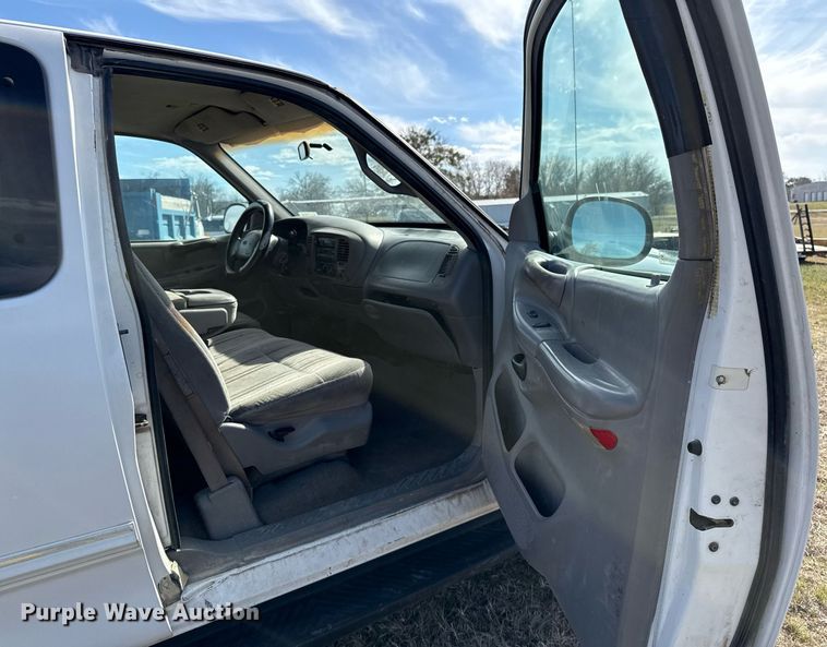 image for item EJ3482 1998 Ford F150 SuperCab flatbed pickup truck 