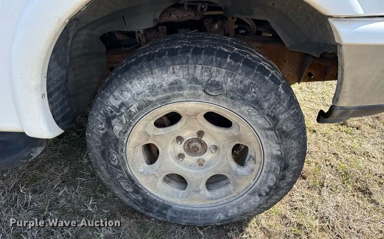 image for item EJ3482 1998 Ford F150 SuperCab flatbed pickup truck 