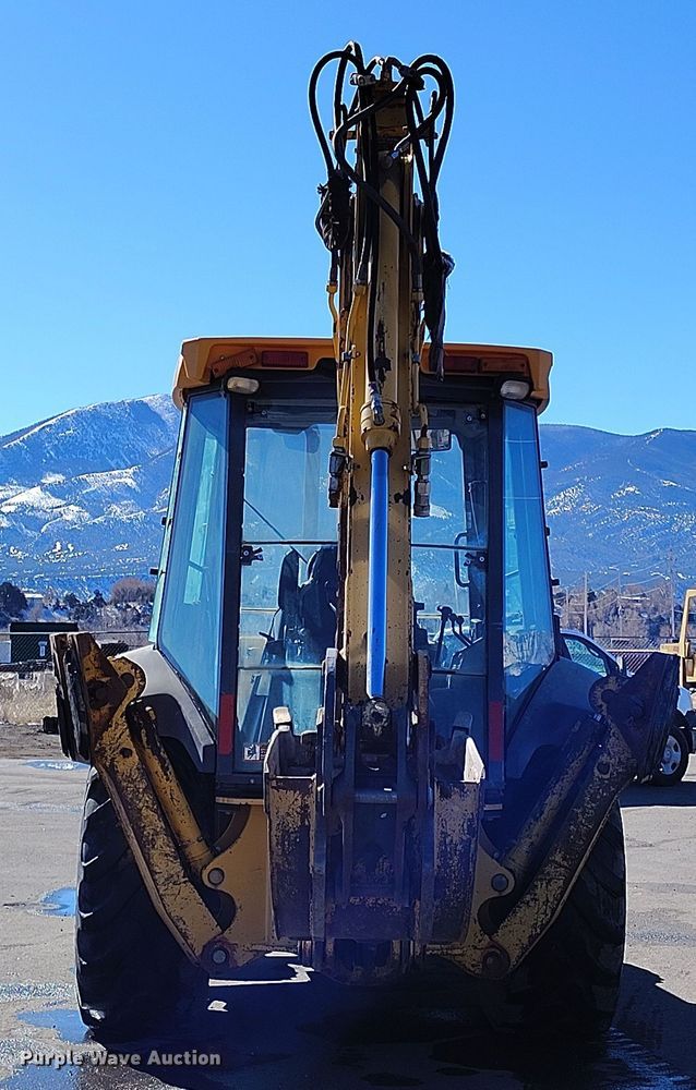 image for item DV6705 2001 John Deere 310G backhoe