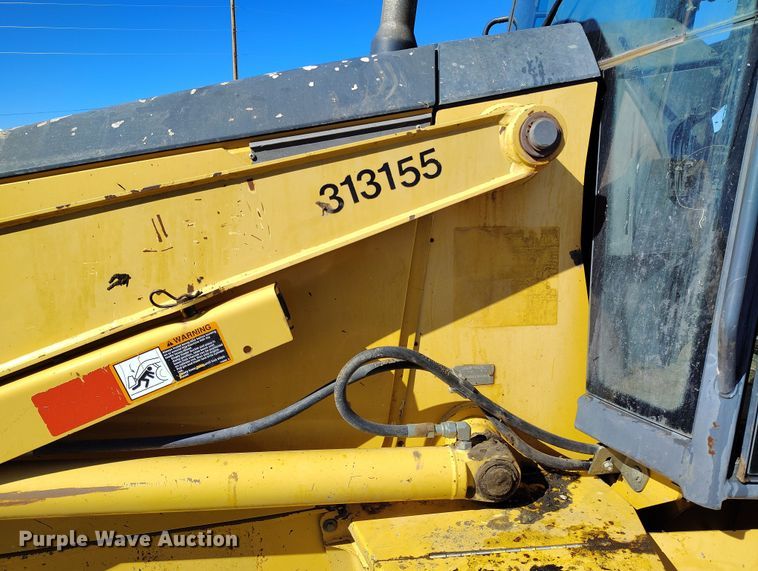 image for item DV6705 2001 John Deere 310G backhoe