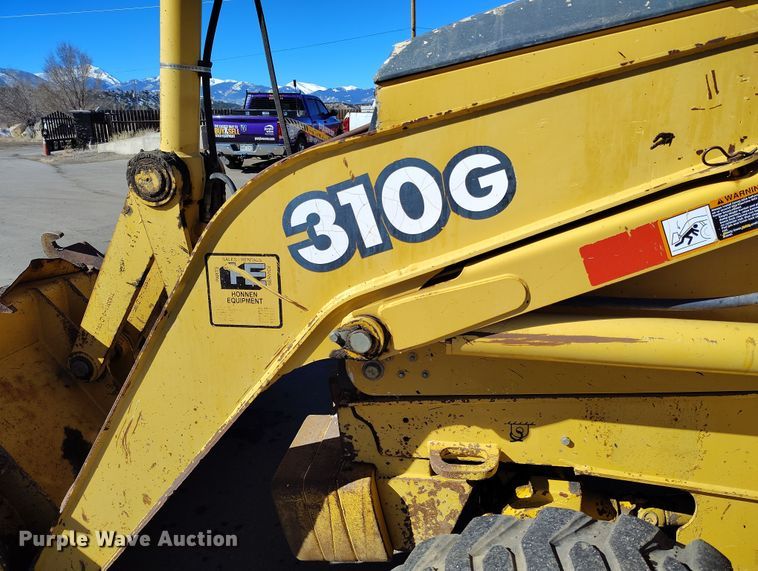 image for item DV6705 2001 John Deere 310G backhoe