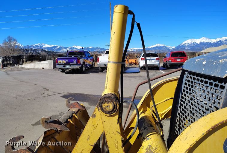 image for item DV6705 2001 John Deere 310G backhoe