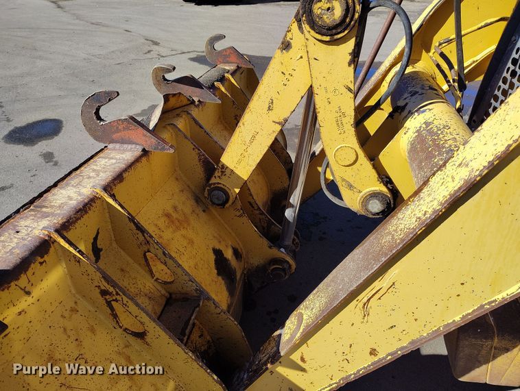 image for item DV6705 2001 John Deere 310G backhoe