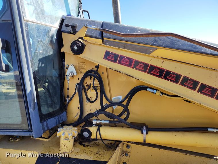 image for item DV6705 2001 John Deere 310G backhoe