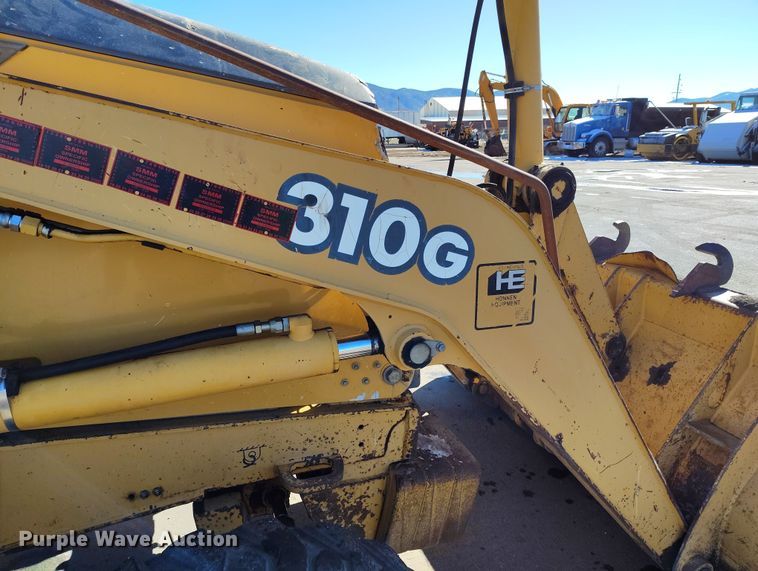 image for item DV6705 2001 John Deere 310G backhoe