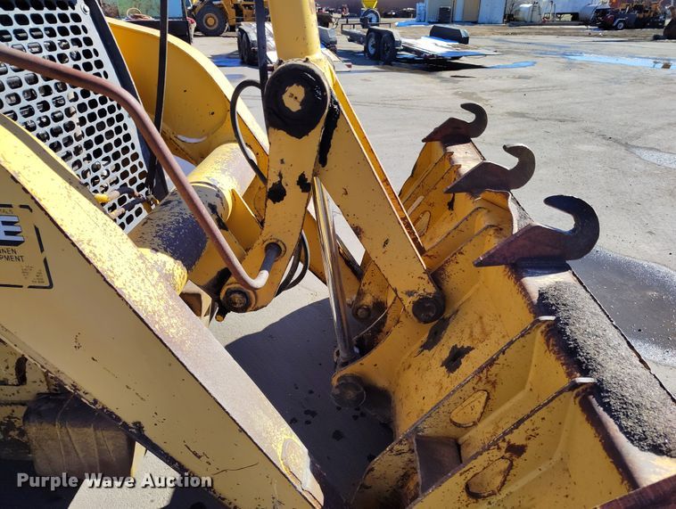 image for item DV6705 2001 John Deere 310G backhoe