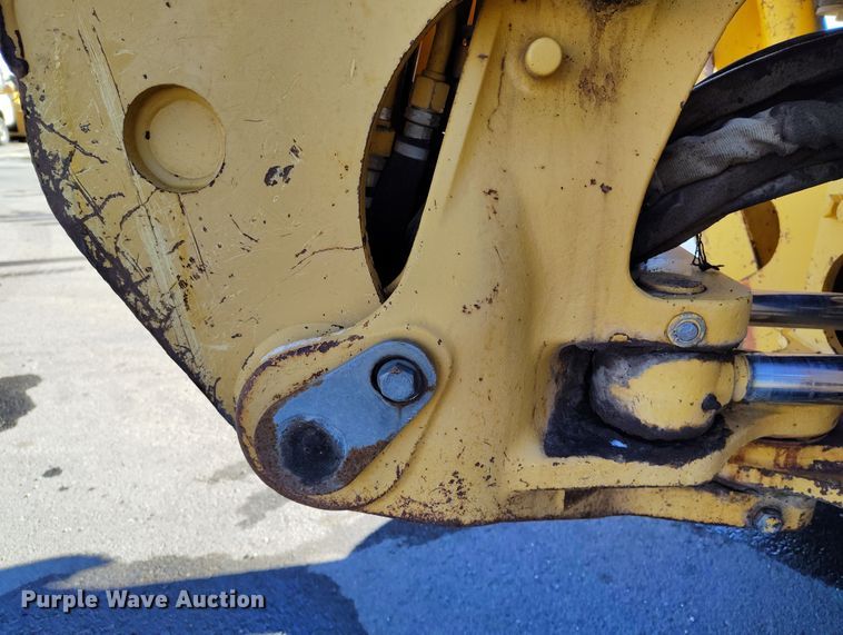 image for item DV6705 2001 John Deere 310G backhoe