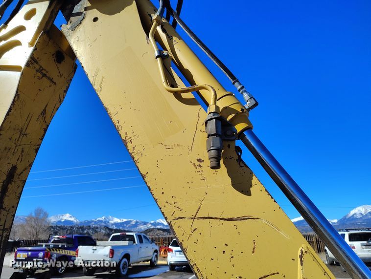 image for item DV6705 2001 John Deere 310G backhoe