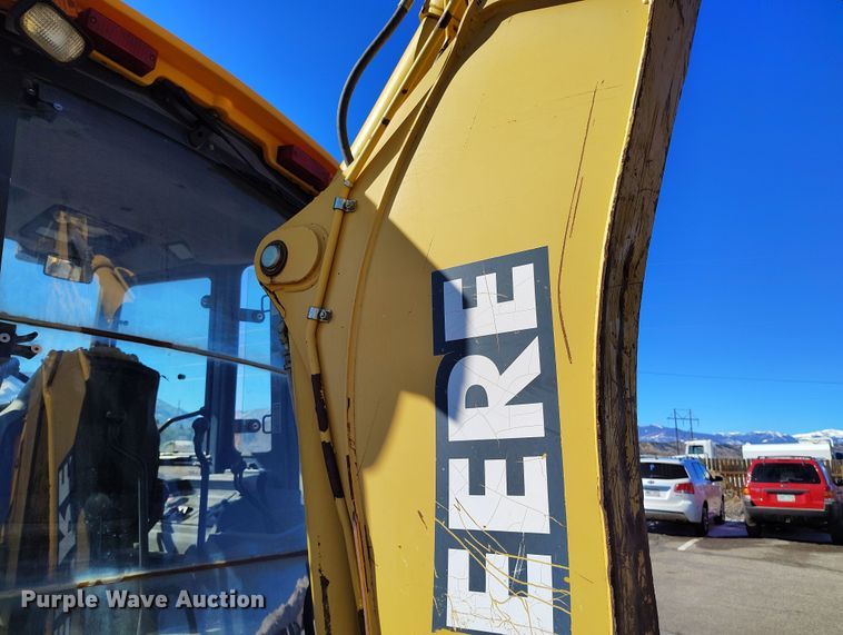 image for item DV6705 2001 John Deere 310G backhoe