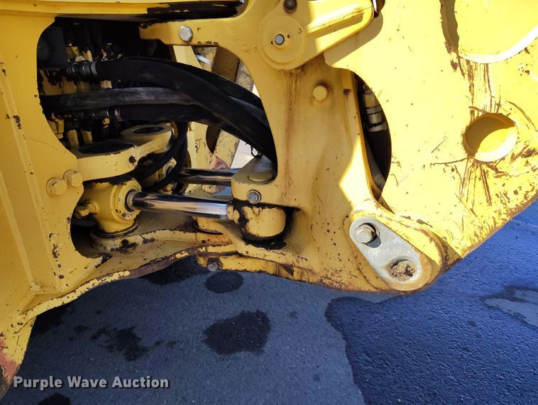 image for item DV6705 2001 John Deere 310G backhoe