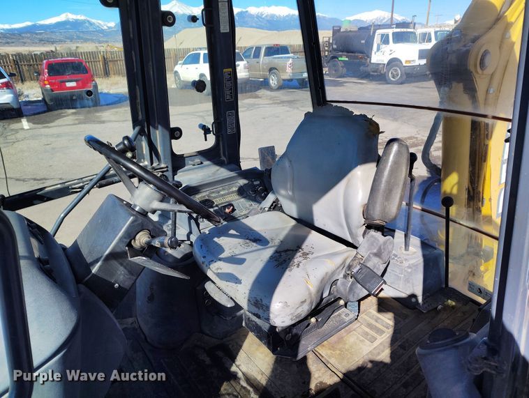 image for item DV6705 2001 John Deere 310G backhoe