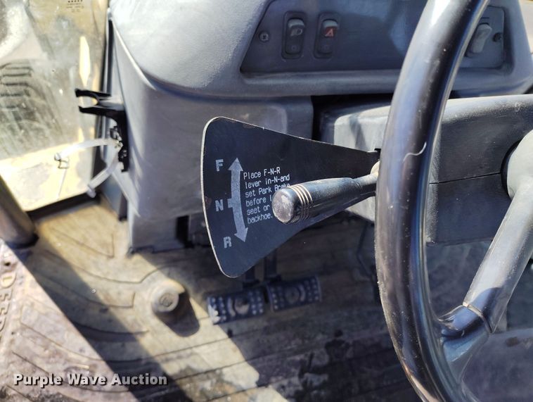 image for item DV6705 2001 John Deere 310G backhoe