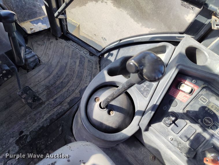 image for item DV6705 2001 John Deere 310G backhoe