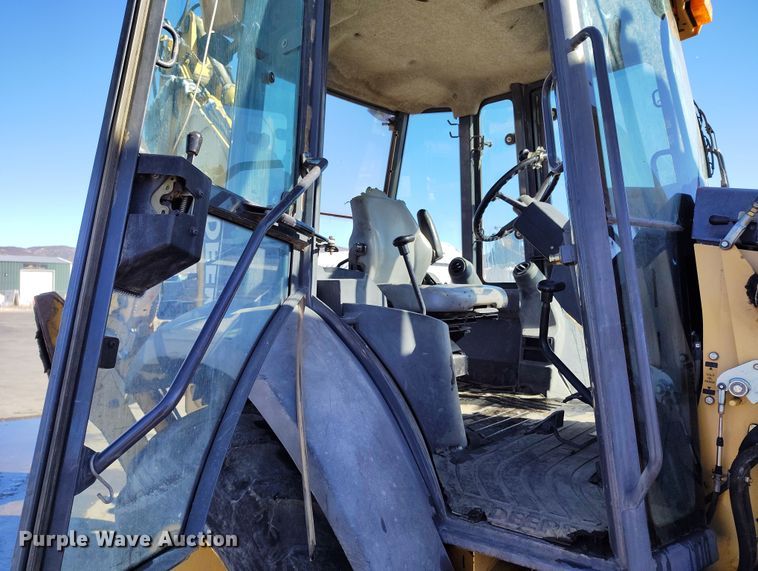 image for item DV6705 2001 John Deere 310G backhoe