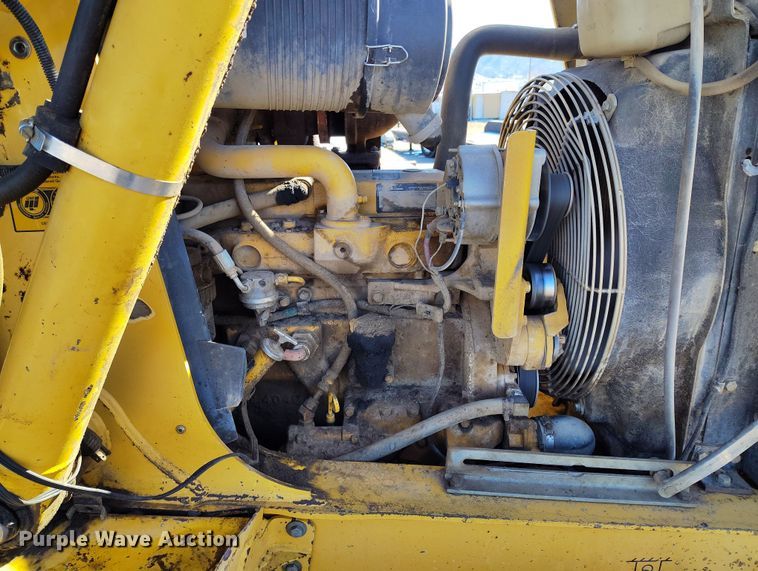 image for item DV6705 2001 John Deere 310G backhoe