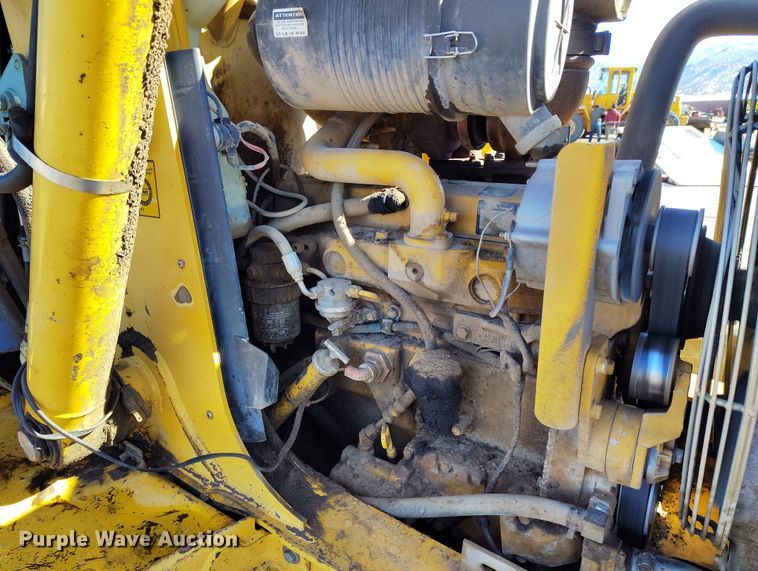 image for item DV6705 2001 John Deere 310G backhoe