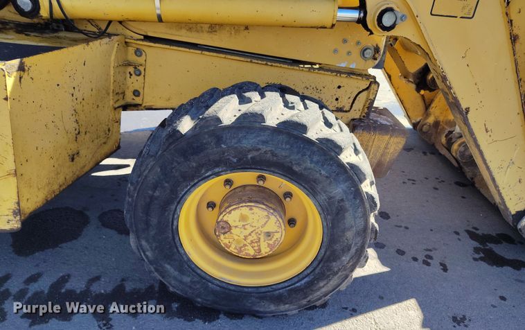 image for item DV6705 2001 John Deere 310G backhoe