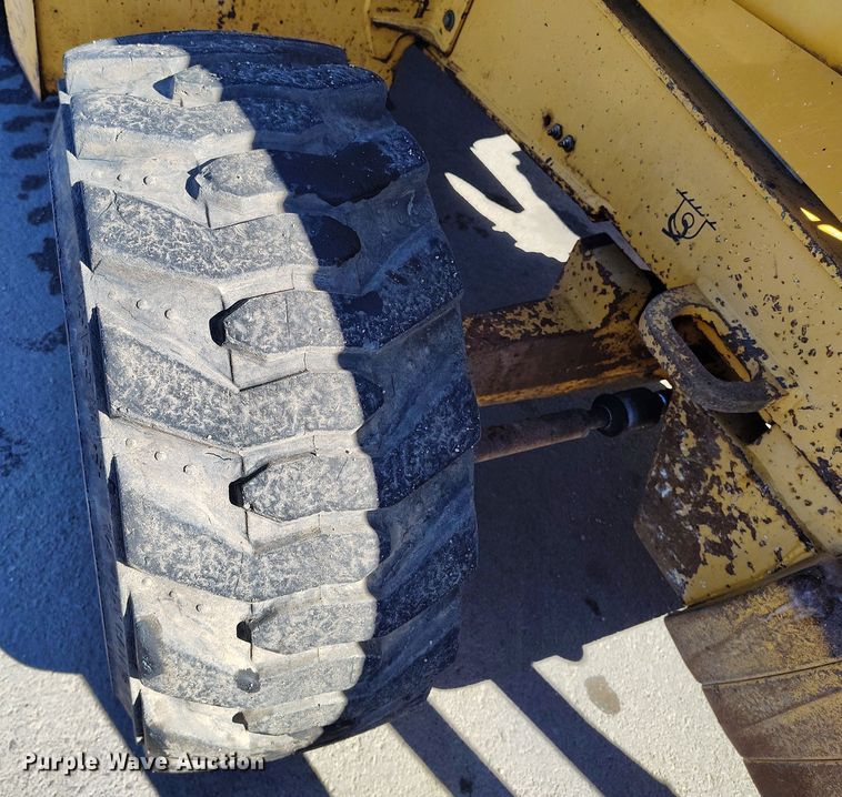 image for item DV6705 2001 John Deere 310G backhoe