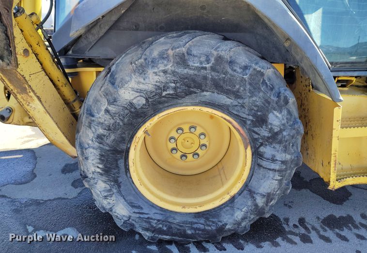 image for item DV6705 2001 John Deere 310G backhoe