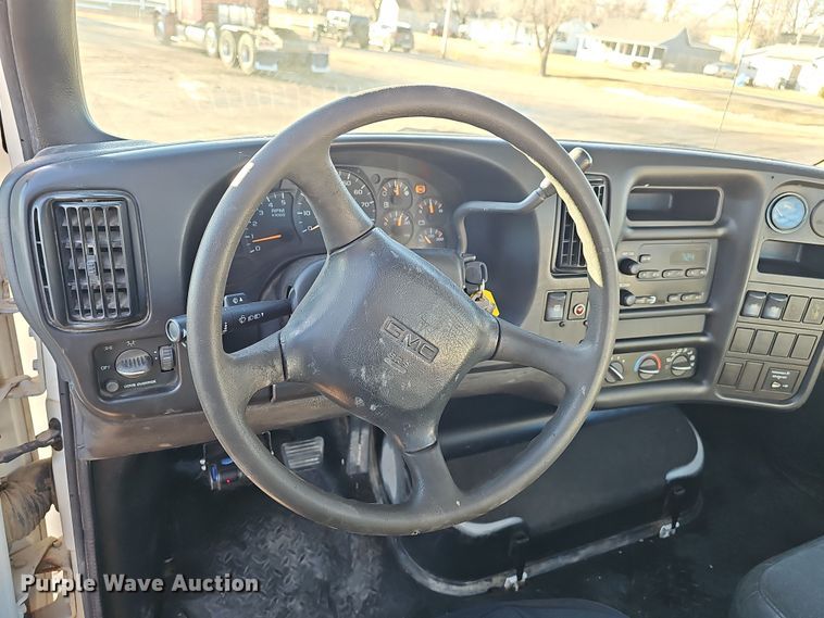 image for item DW3164 2003 GMC C4500 flatbed truck