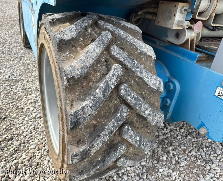 image for item EQ1104 2006 Genie GS-3268 RT scissor lift