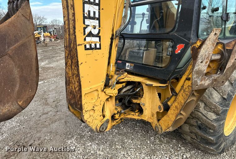 image for item EQ6588 1998 John Deere 310E backhoe