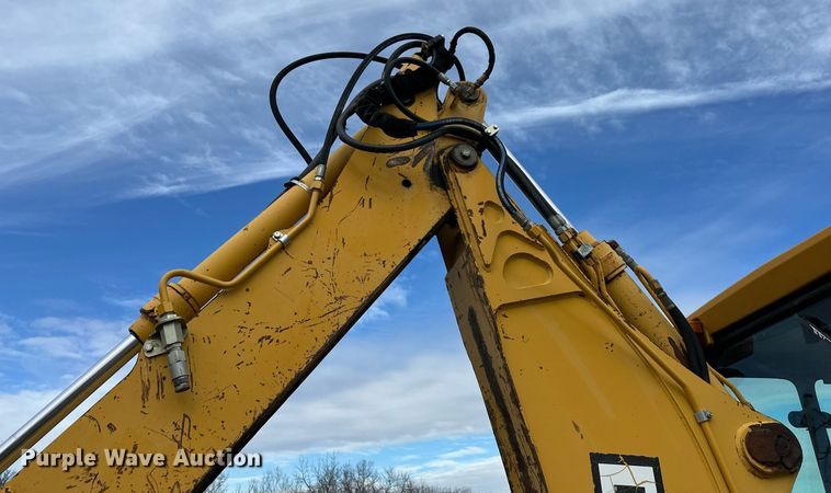 image for item EQ6588 1998 John Deere 310E backhoe