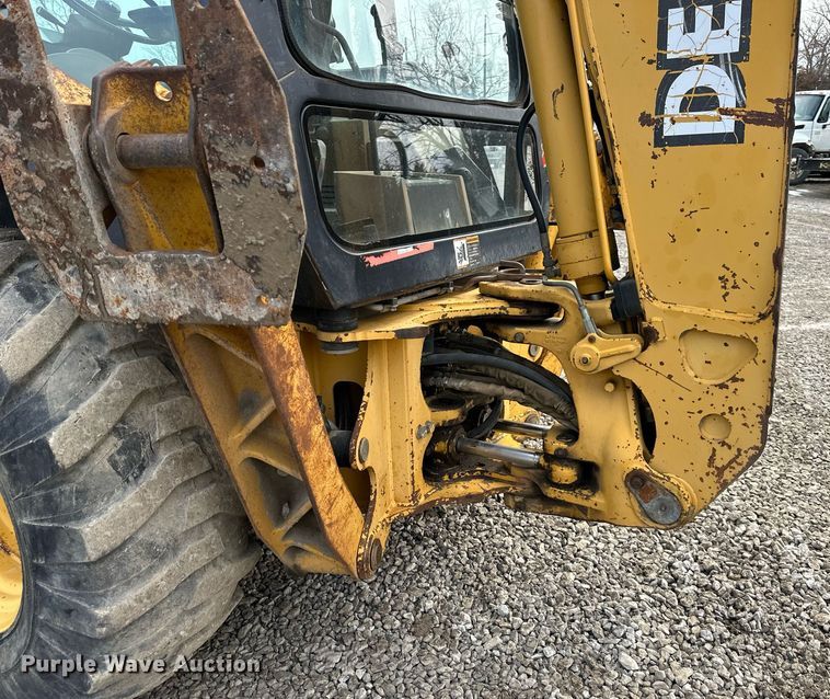 image for item EQ6588 1998 John Deere 310E backhoe