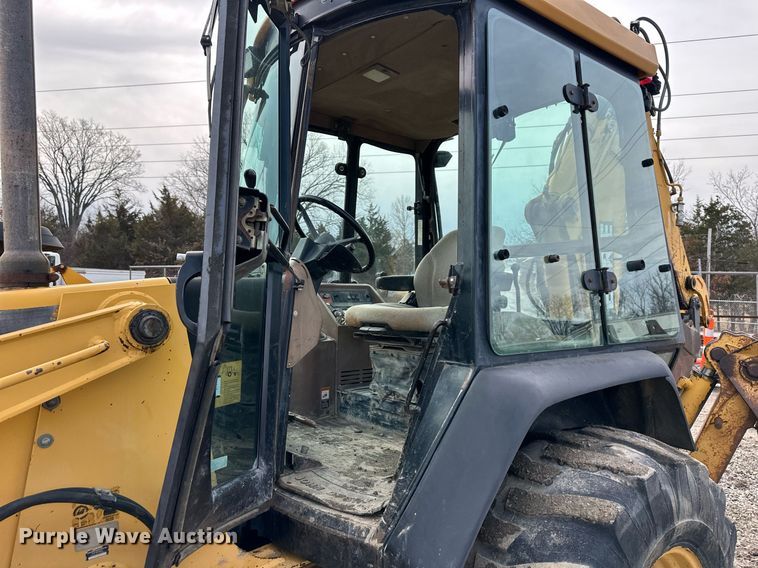 image for item EQ6588 1998 John Deere 310E backhoe