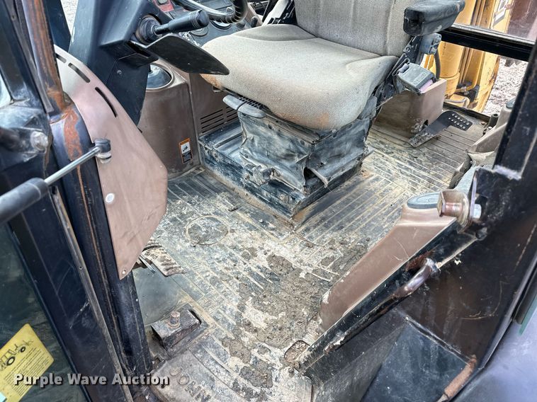 image for item EQ6588 1998 John Deere 310E backhoe