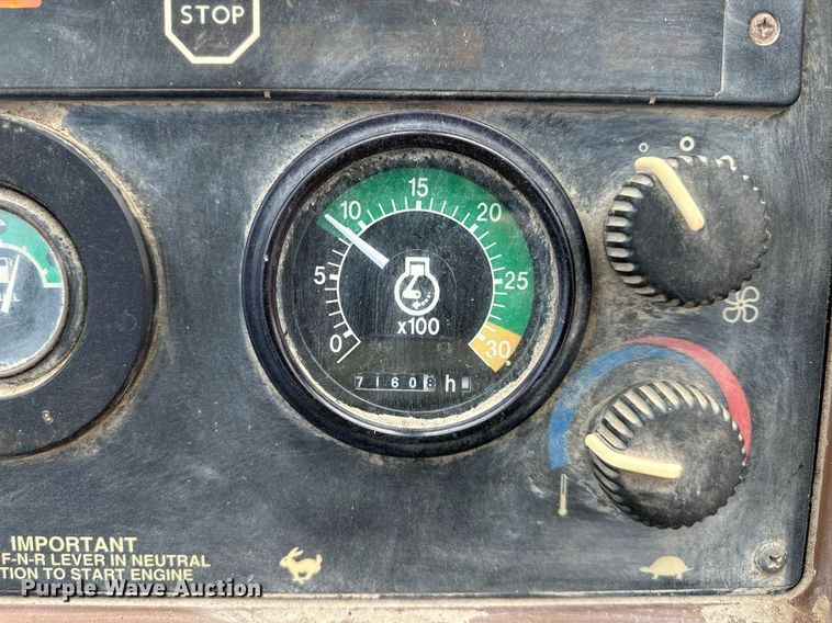 image for item EQ6588 1998 John Deere 310E backhoe