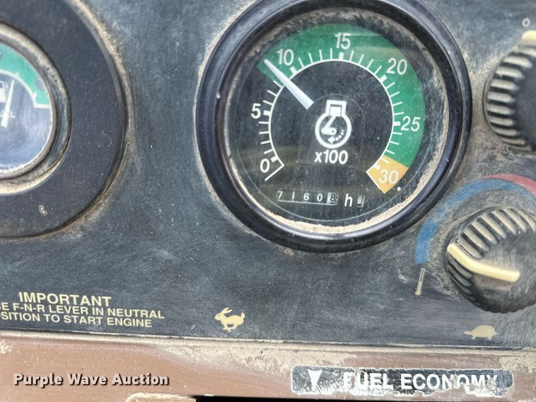 image for item EQ6588 1998 John Deere 310E backhoe