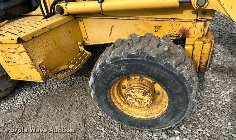 image for item EQ6588 1998 John Deere 310E backhoe