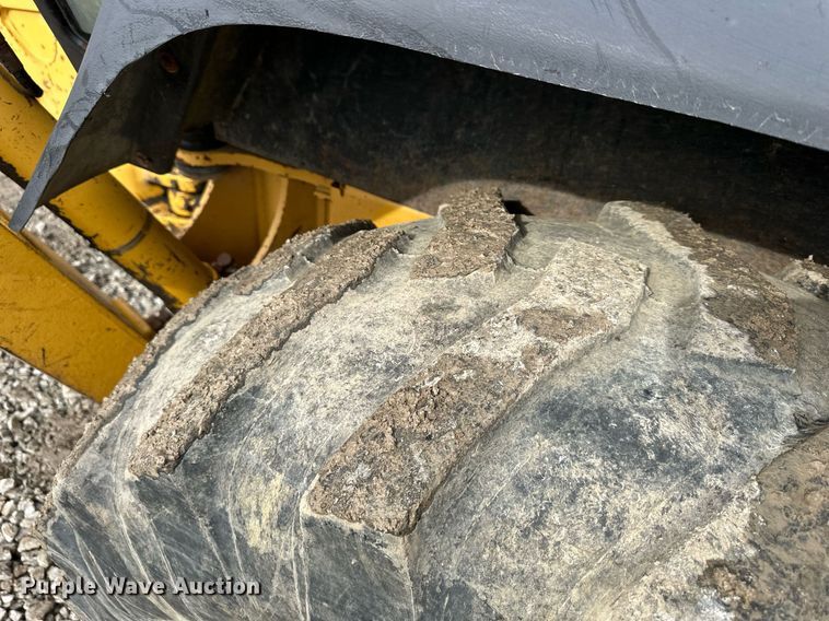 image for item EQ6588 1998 John Deere 310E backhoe