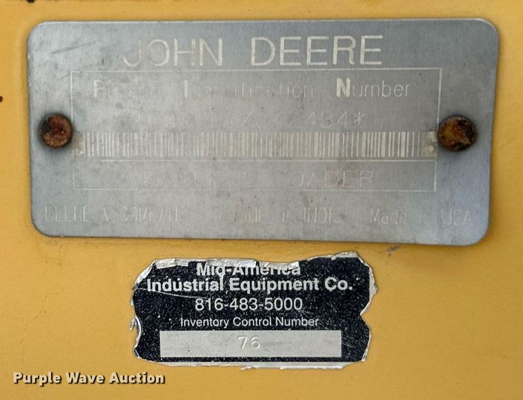 image for item EQ6588 1998 John Deere 310E backhoe