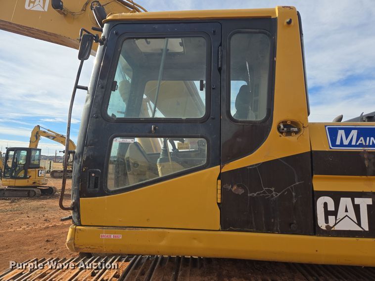 image for item ER5179 1996 Caterpillar 320L excavator