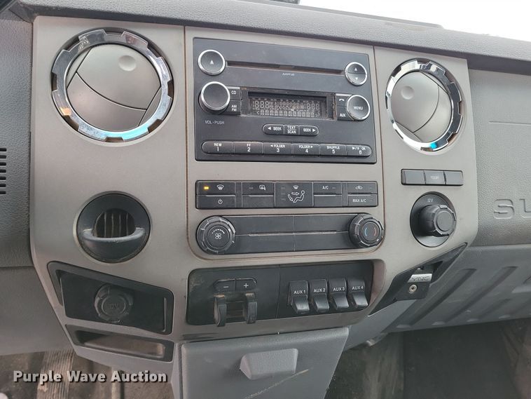 image for item NB9876 2016 Ford F450 Super Duty Crew Cab flatbed truck