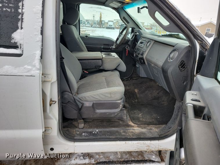 image for item NB9876 2016 Ford F450 Super Duty Crew Cab flatbed truck