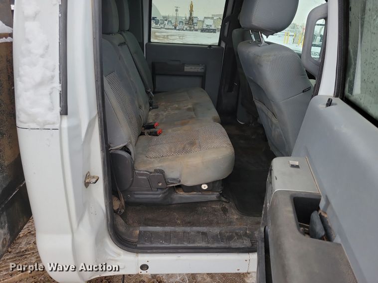 image for item NB9876 2016 Ford F450 Super Duty Crew Cab flatbed truck