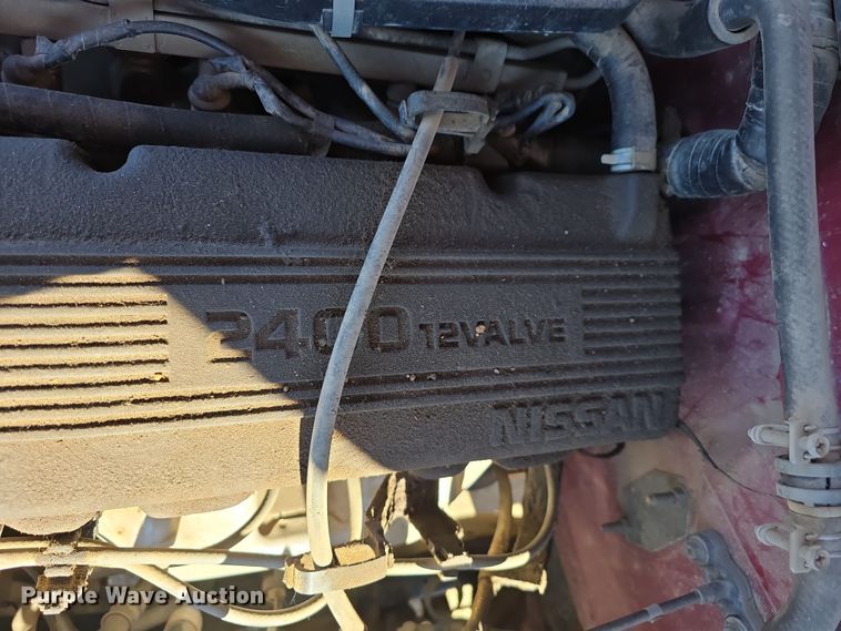 image for item EH8659 1994 Nissan XE King Cab pickup truck